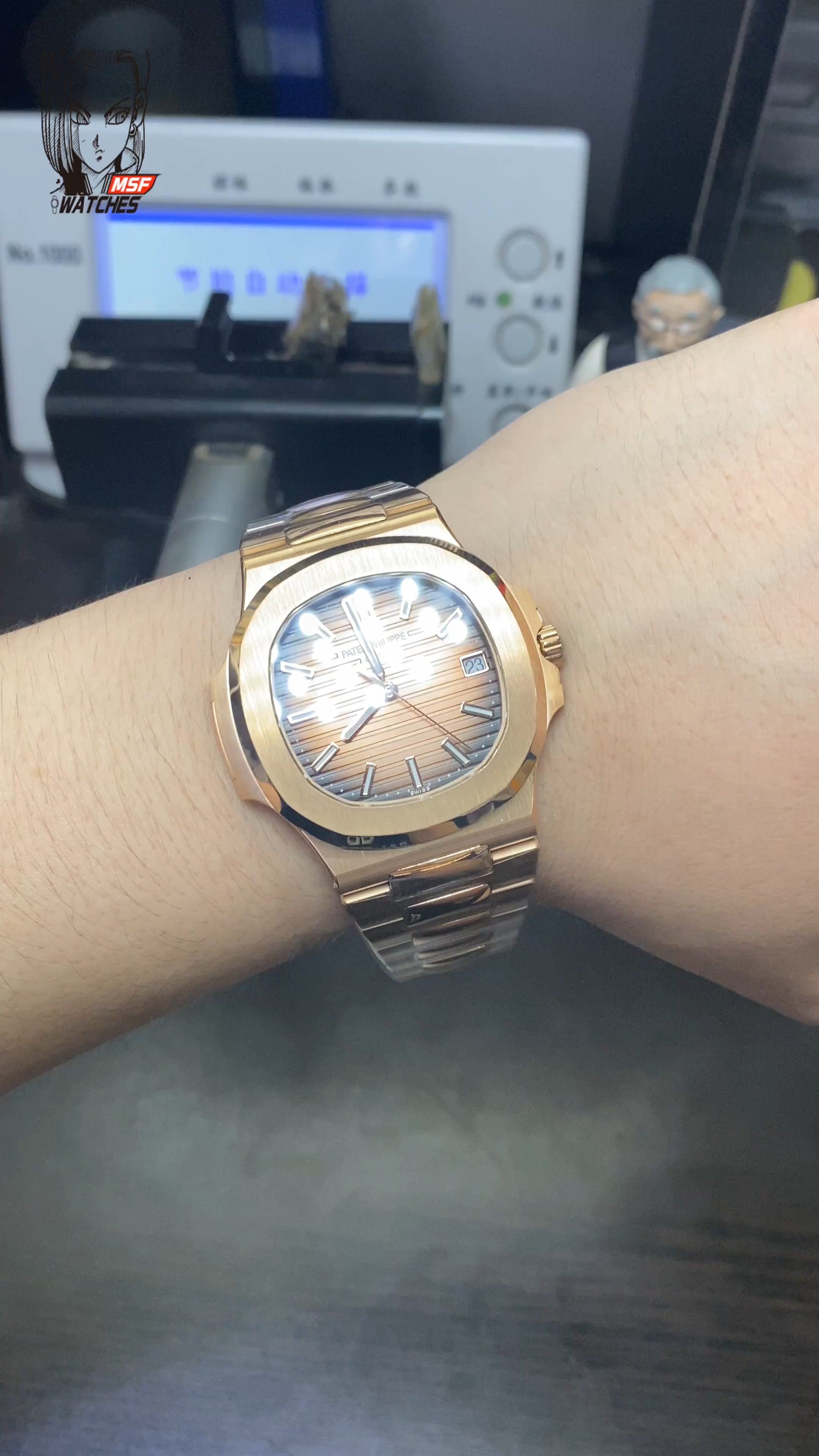 Patek Philippe Nautilus series 57111R-001, Rose Gold Case with Gradient Dark Brown Dial Steel Bracelet, 40mm Size.
