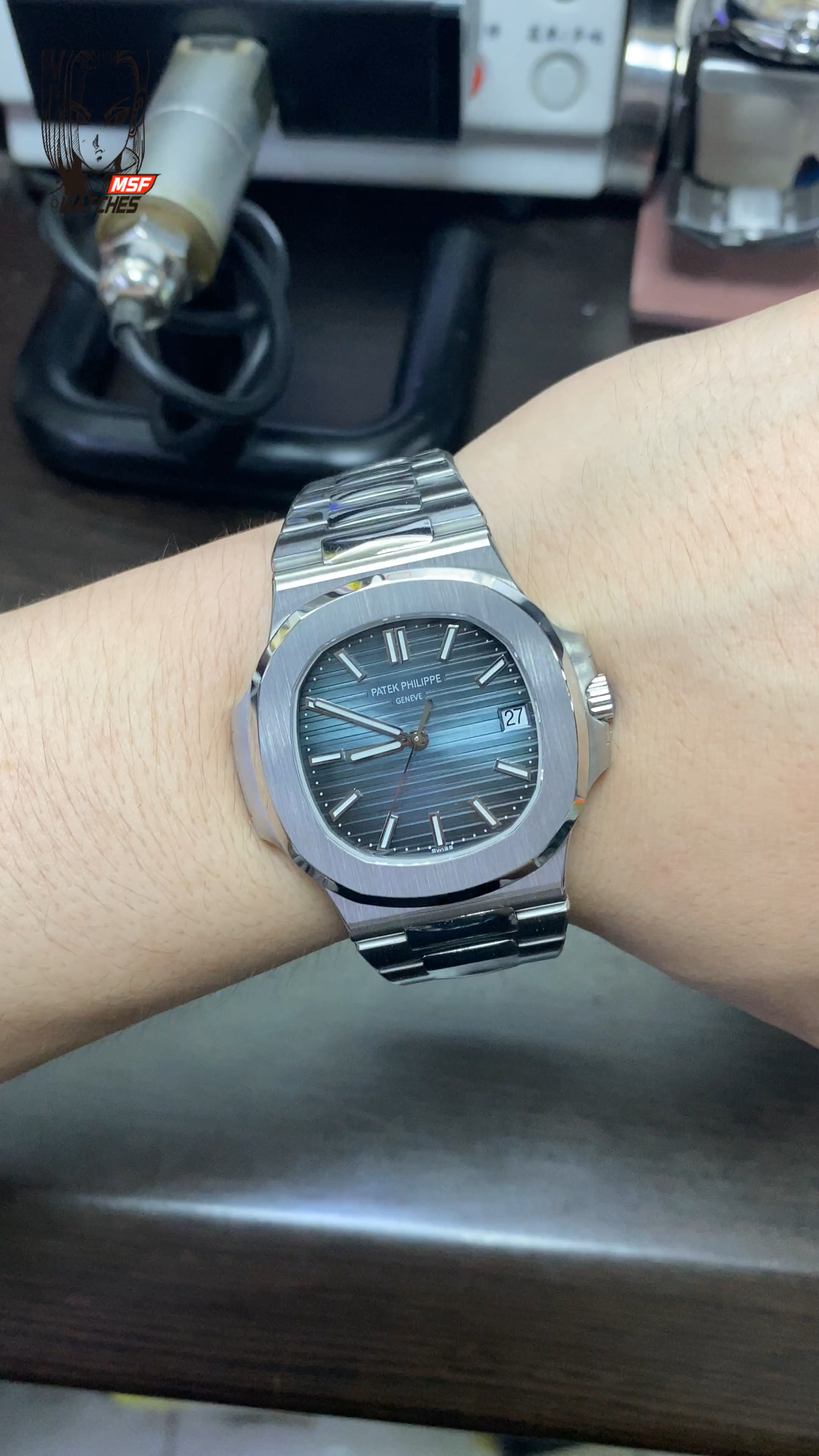 Patek Philippe Nautilus series 57111A 010, Stainless Steel Case Grey-Blue Dial Stainless Steel Bracelet, 40mm Size.
