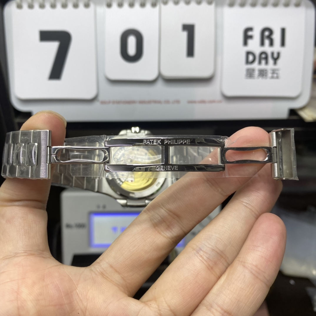 Patek Philippe Nautilus series 58111G-001, White Case with Blue Dial, 40mm Size.