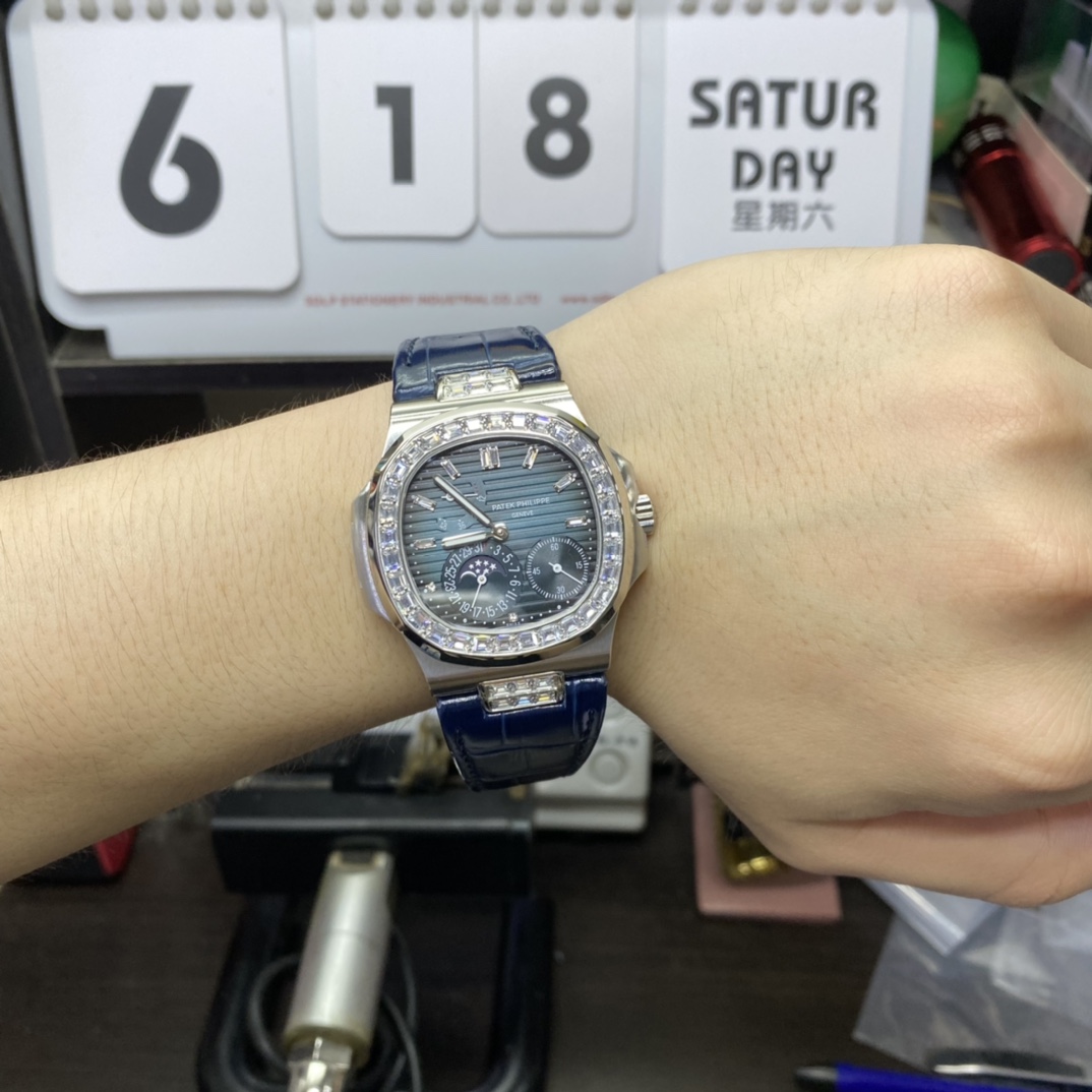 Patek Philippe Nautilus series 5724G-001, Square Diamond Bezel Blue Dial Blue Leather Strap, 40mm size.