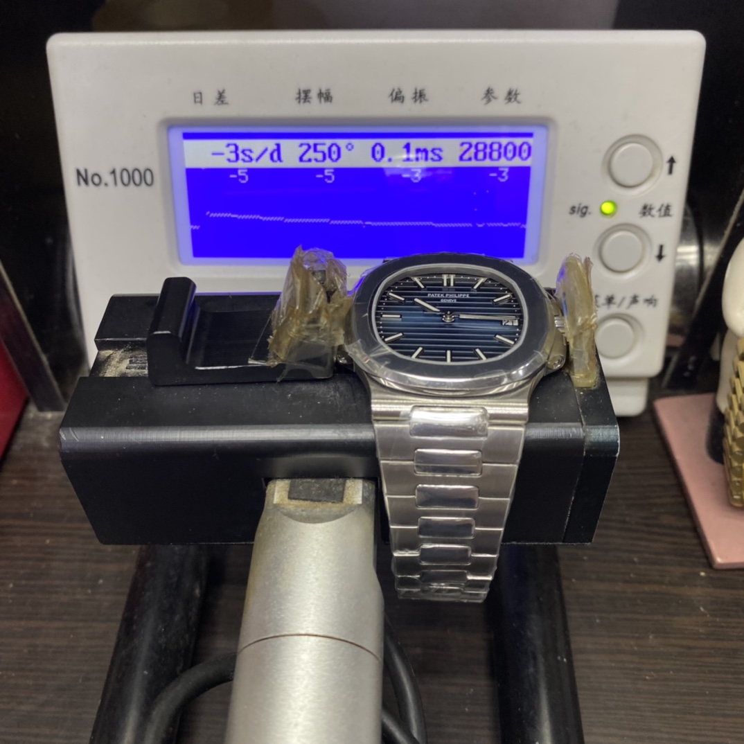 Patek Philippe Nautilus series 58111G-001, White Case with Blue Dial, 40mm Size.