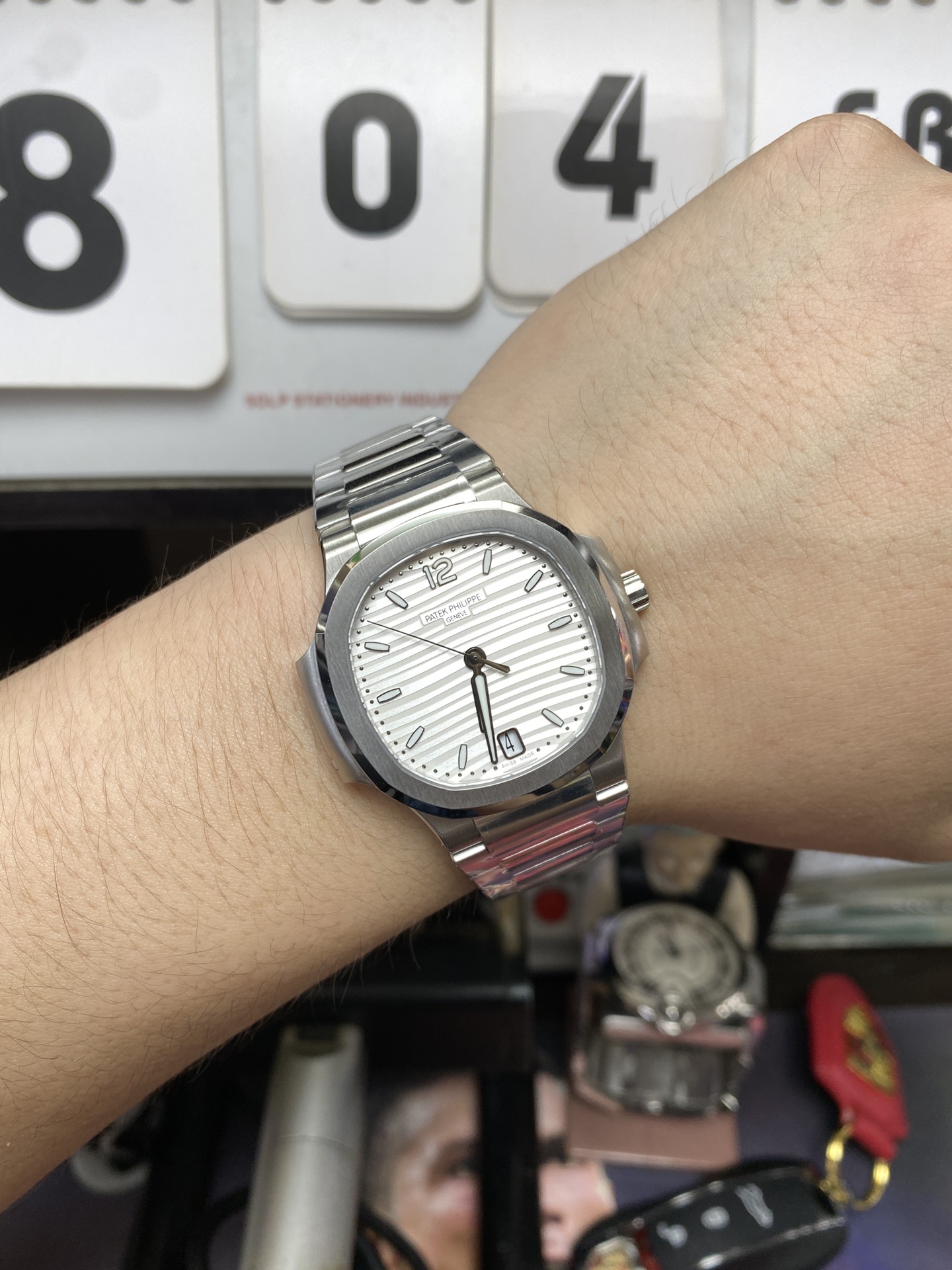 Patek Philippe Nautilus series 71181A-010, White Dial with Steel Bracelet Version, 35.2mm size.