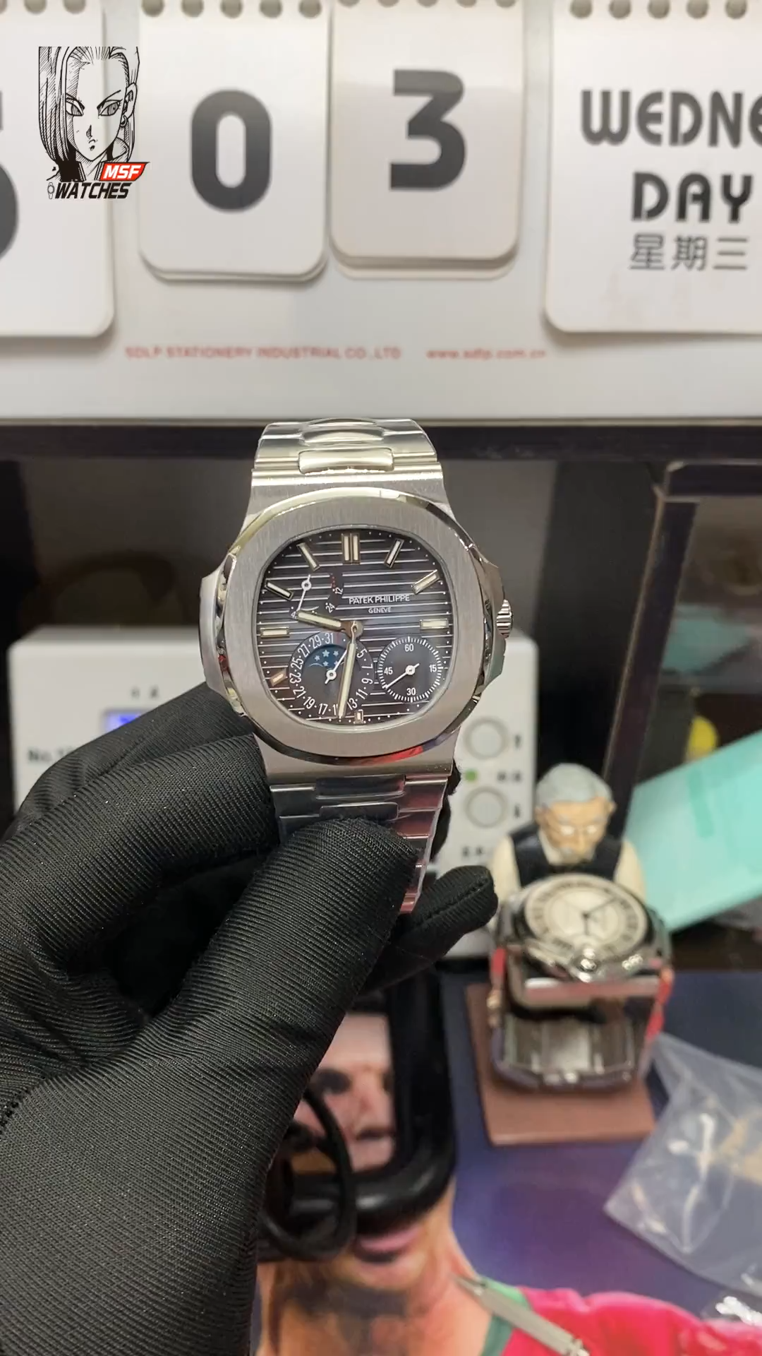 Patek Philippe Nautilus series 57121A-001, Blue Dial Steel Bracelet, Synchronized Functions, 40mm size.