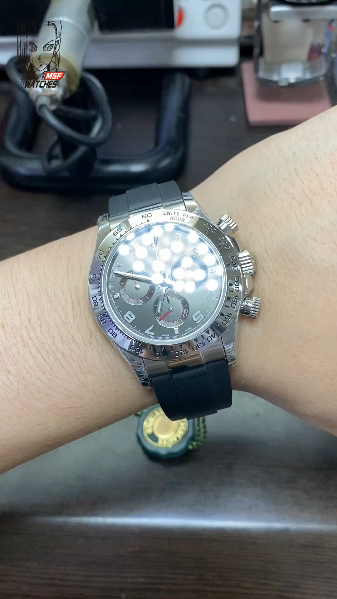 Rolex Cosmograph Daytona Series 116519-0104, Grey Dial with Red Hands Roman Numerals, 40mm size.