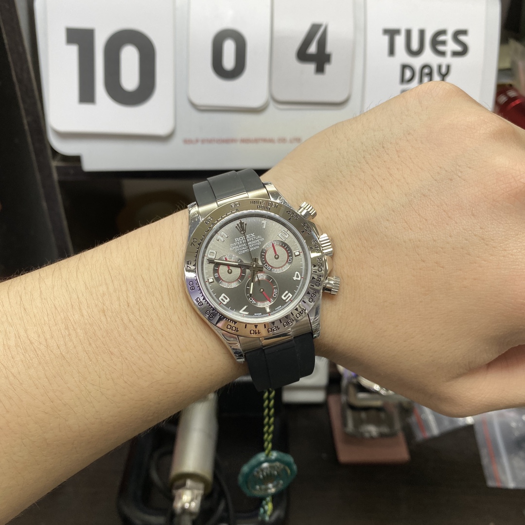 Rolex Cosmograph Daytona Series 116519-0104, Grey Dial with Red Hands Roman Numerals, 40mm size.