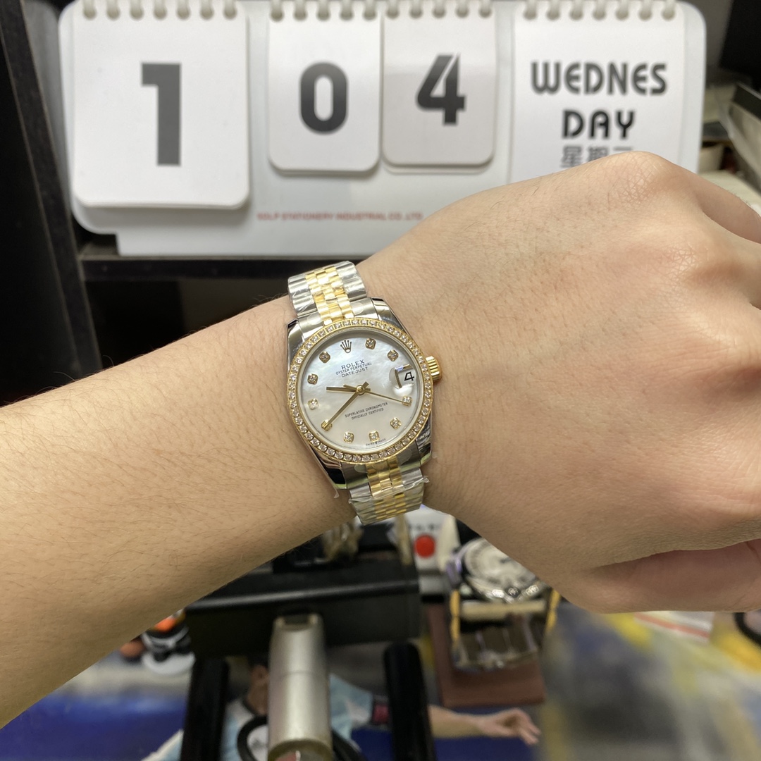 Rolex Datejust Series m278383rbr-0028, Two-Tone Gold Case with Mother-of-Pearl Dial and Diamond Bezel, 31mm size, Jubilee stainless steel bracelet.