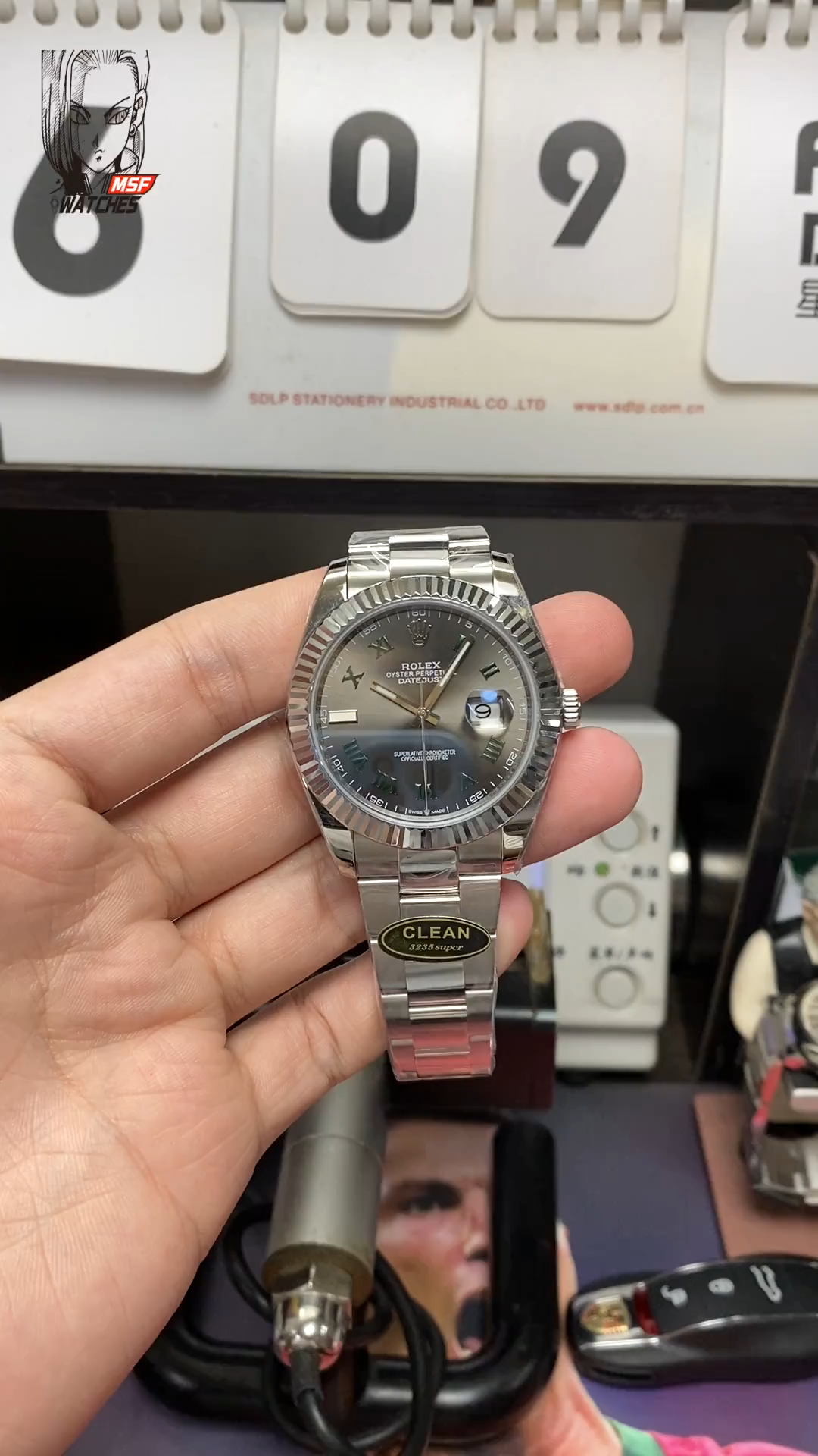 Rolex Datejust series m126334-0021, Grey Dial Green Roman Numerals, 41mm size. Oyster strap