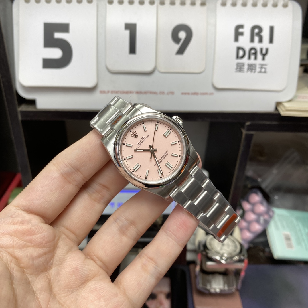 Rolex Oyster Perpetual Series m126000-0008, Pink Dial, 36mm size.