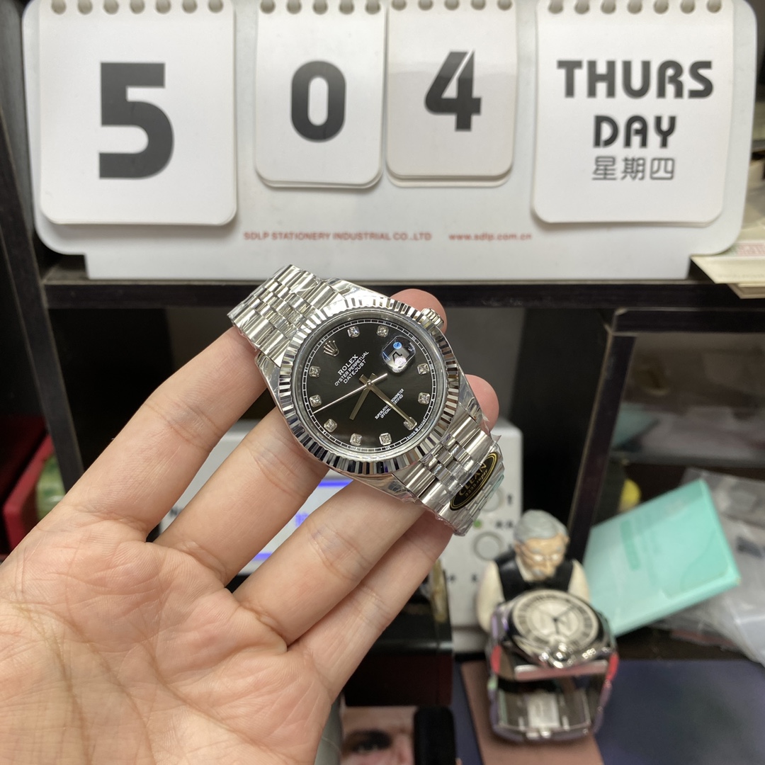 Rolex Datejust series m126334-0012, Black Dial Diamond Markers, 41mm size.