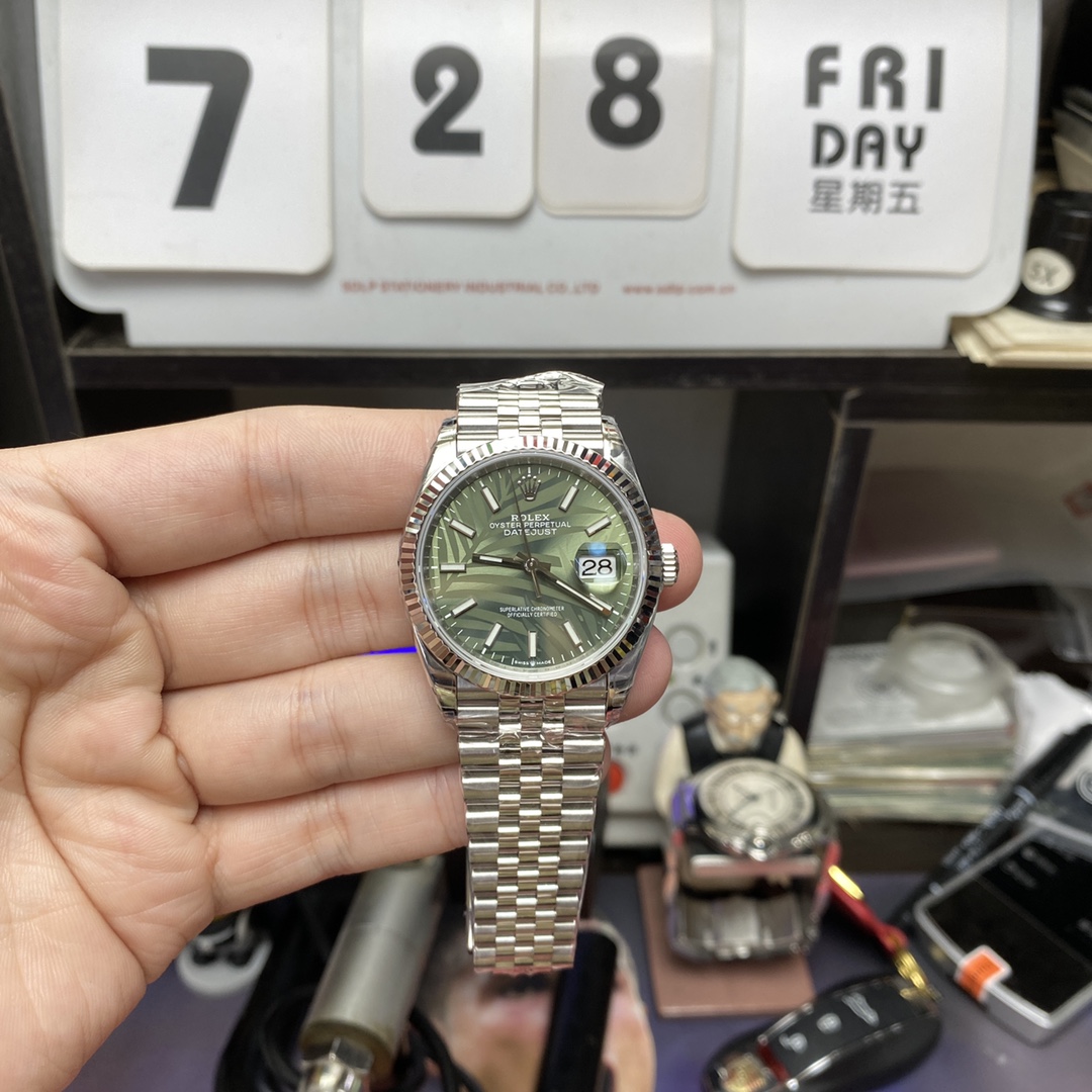 Rolex Datejust series m126234-0047, Palm Leaf Pattern on a Green Dial, 36mm size, Jubilee stainless steel bracelet.