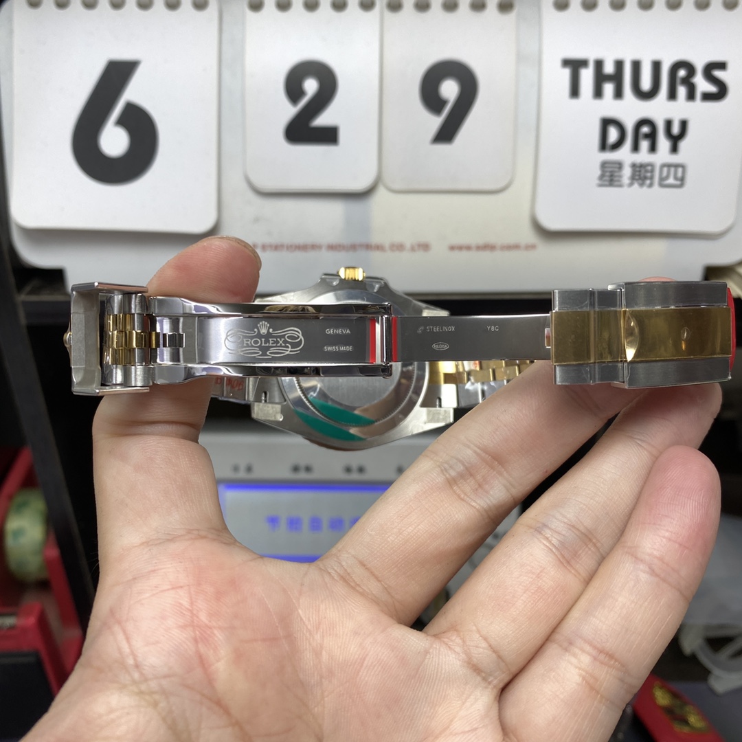 Rolex GMT-Master II series m126713grnr-0001, InterGold Black/Grey Ceramic Bezel InterGold Five-Bead Chain Steel Bracelet, 40mm size.