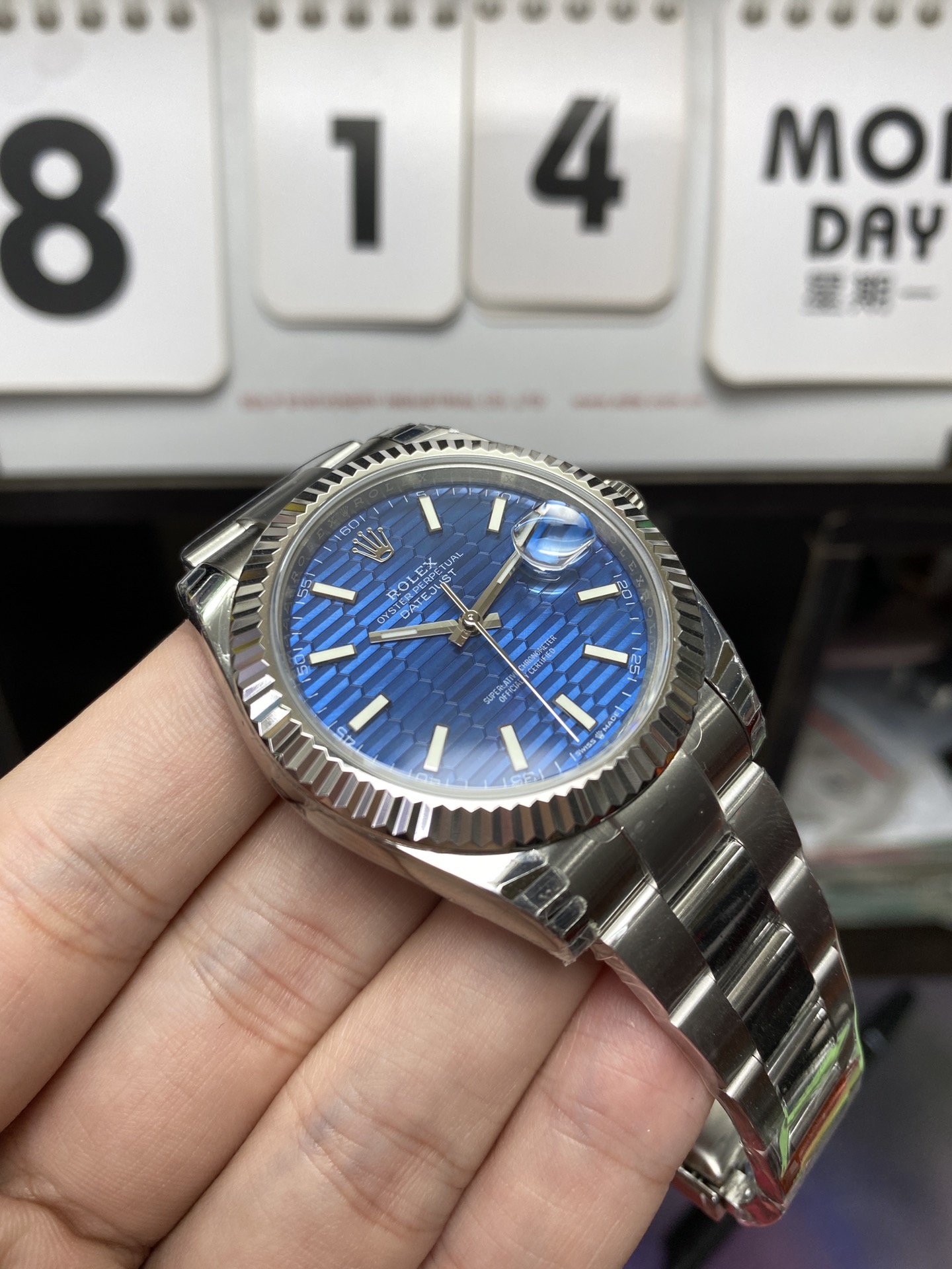 Rolex Datejust Series m126334-0031, Blue Checkered Dial Fluted Bezel, 41mm size, Jubilee Bracelet.