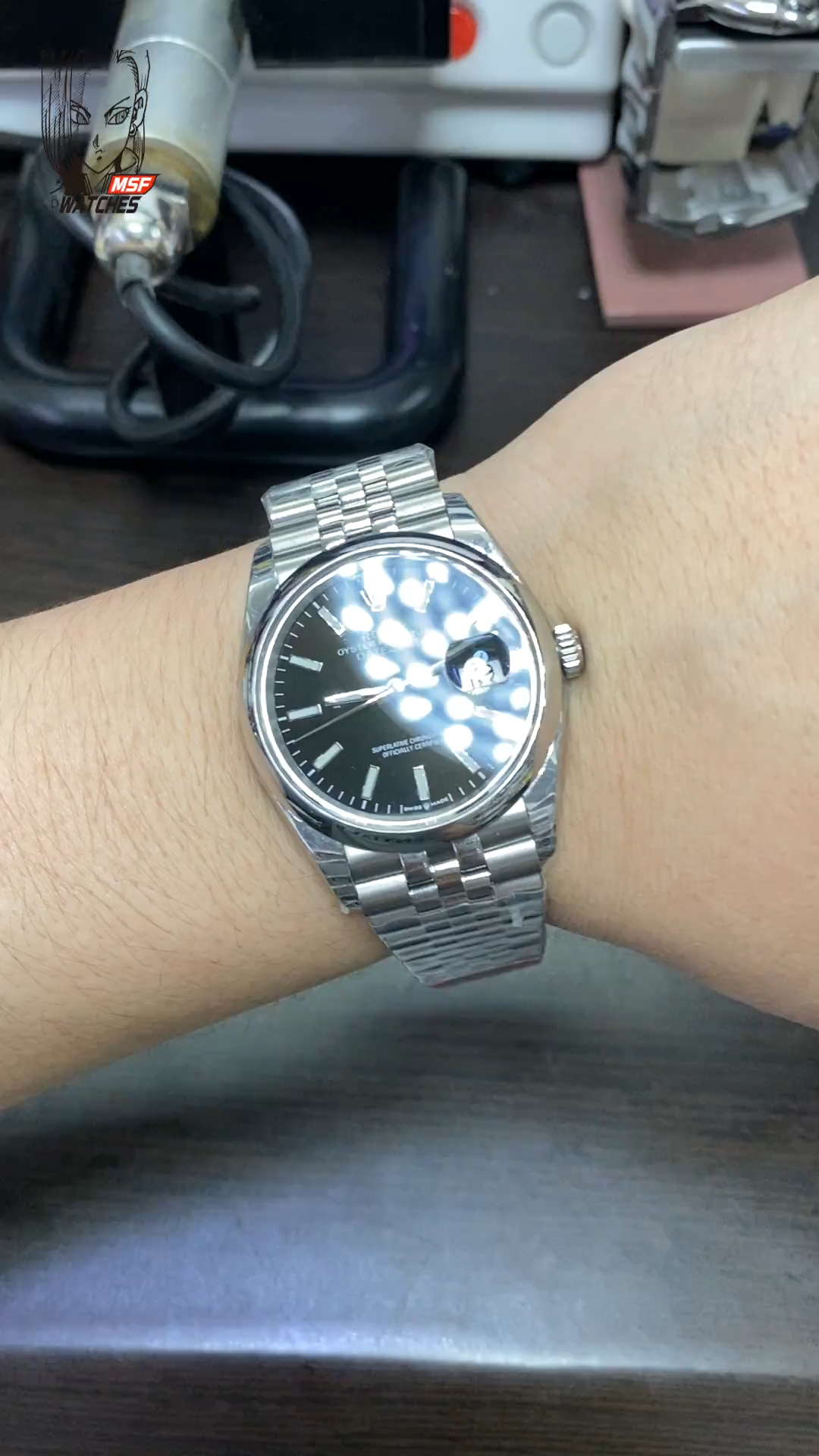 Rolex Datejust Series m126200-0003, Black Dial with Fluted Bezel and Five-link Bracelet, 36mm Size.