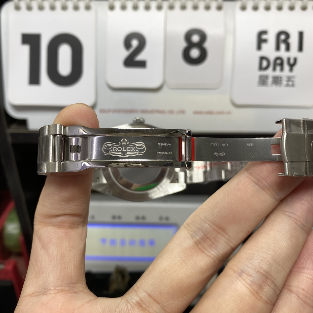 Rolex Oyster Perpetual series m124300-0002, Black Dial with Stick Indexes, 41mm size.