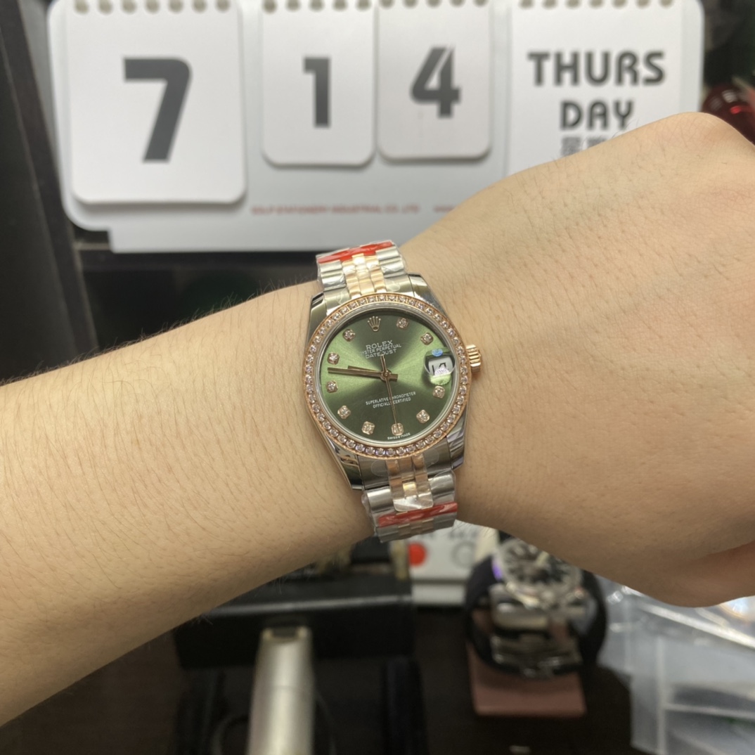Rolex Datejust series m278383rbr-0030, Two-Tone Gold Case with Green Dial and Diamond Bezel, 31mm size, Jubilee bracelet.