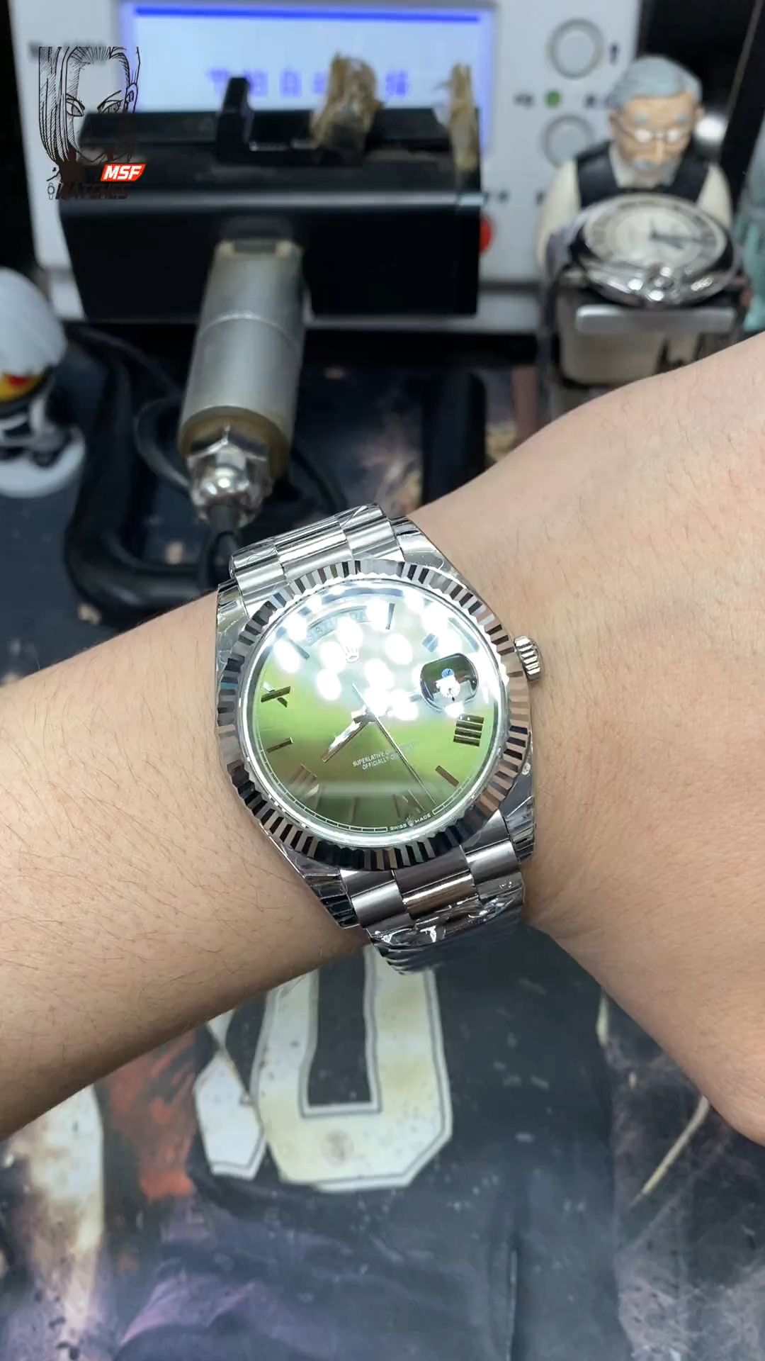 Rolex Day-Date series m228239-0033, Silver Case Olive Green Dial with Roman Numeral Markers, Instantaneous Day and Date Functions, 40mm Size.