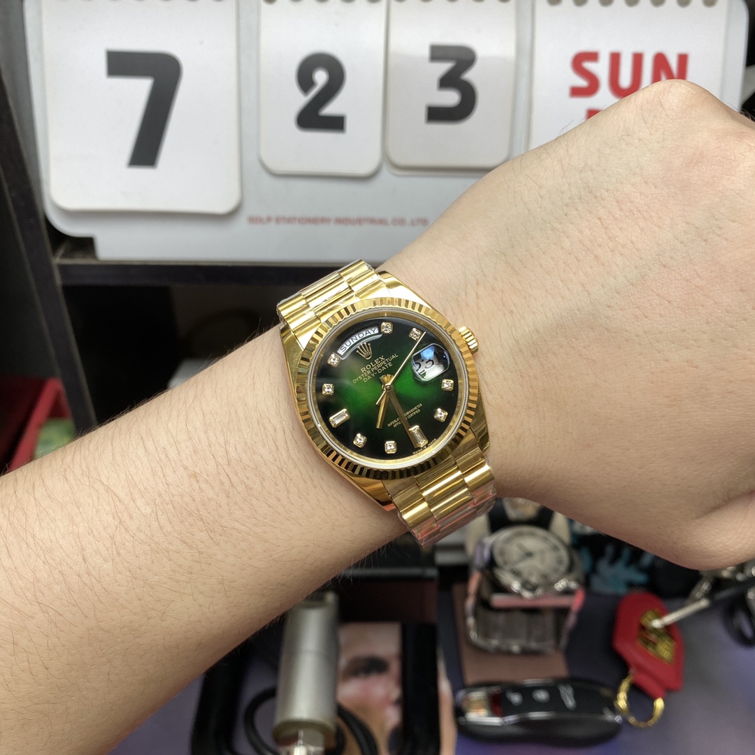 Rolex Day-Date series m128238-0069, Full Gold with Green Dial Diamond Hour Markers, 36mm Size.