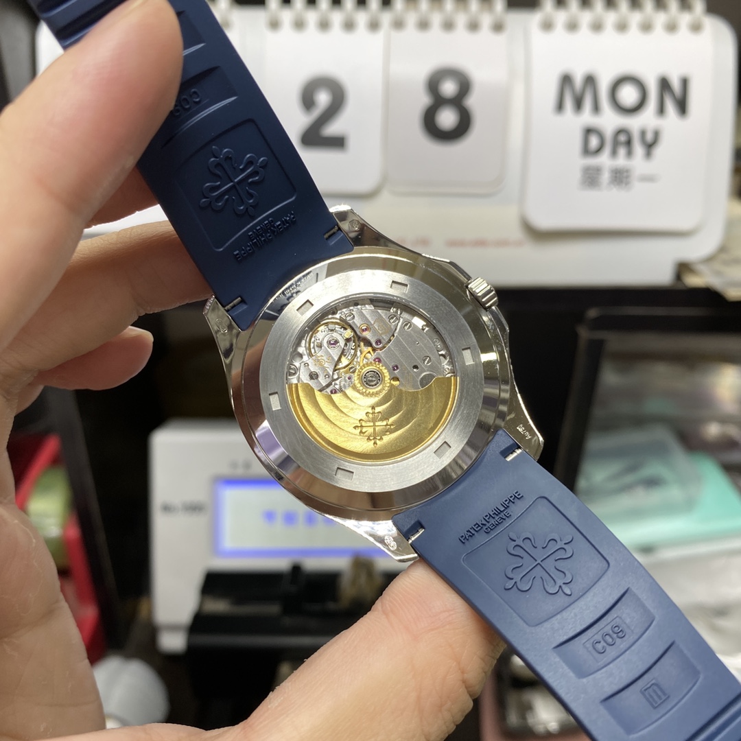 Patek Philippe Aquanaut Series 5168G-001, Gradient Blue Dial Blue Rubber Strap, 42.2mm Size.